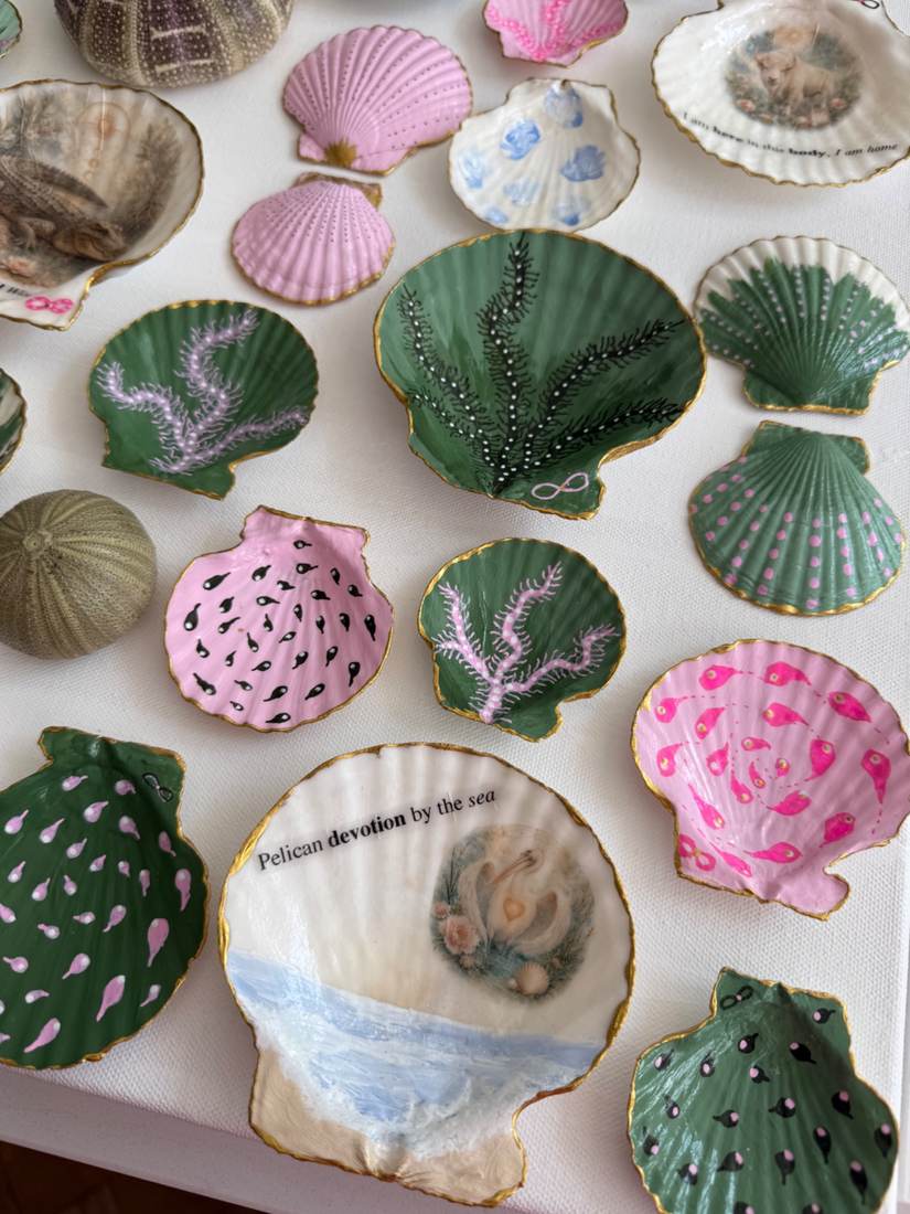 Close-up of Sacred Waters showing pelican and hand-painted shells
